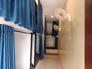 Postel nebo postele na pokoji v ubytování Blue Zone Hostel