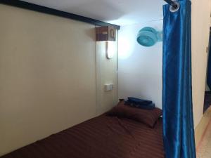 Postel nebo postele na pokoji v ubytování Blue Zone Hostel