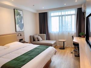 TV a/nebo společenská místnost v ubytování Green Tree Inn Huangshan Yi County Xidi Hongcun