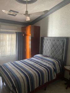 Postel nebo postele na pokoji v ubytování Hotel Posada Gabriel
