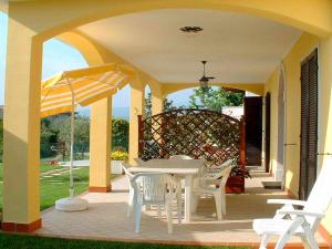 A seating area at Holiday Home in Lazise near Lake Garda