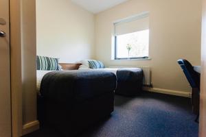 Postel nebo postele na pokoji v ubytování DCU Rooms Glasnevin - Campus Accommodation