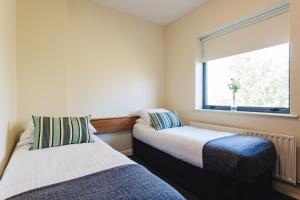Postel nebo postele na pokoji v ubytování DCU Rooms Glasnevin - Campus Accommodation