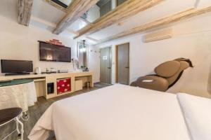 Μια τηλεόραση ή/και κέντρο ψυχαγωγίας στο Goodstay Hotel I