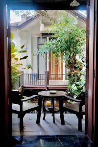 Balkón nebo terasa v ubytování Lunar Mansion Hotel - โรงแรม ลูน่า แมนชั่น เชียงใหม่