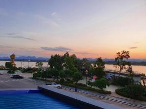 a view from the roof of a building at sunset at THE S VILLAS HOTEL in Nakhon Phanom