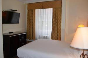 Postel nebo postele na pokoji v ubytování Post Hotel