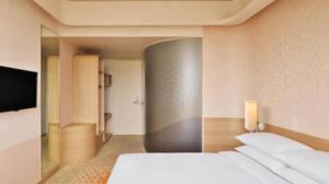 Postel nebo postele na pokoji v ubytování Fairfield by Marriott Chennai Mahindra World City