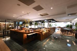 Veitingastaður eða matsölustaður á Via Hotel Breeze