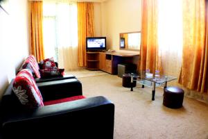 TV a/nebo společenská místnost v ubytování Hotel Condori