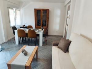 a living room with a table and a couch at Paradis Calpe in Calpe