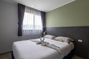 Ένα ή περισσότερα κρεβάτια σε δωμάτιο στο Mountain View Studio Apt T3-830
