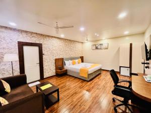 Letto o letti in una camera di Shankar Bhavan By Vinayak Hotels