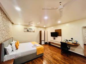 Postel nebo postele na pokoji v ubytování Shankar Bhavan By Vinayak Hotels + 37 fotografií