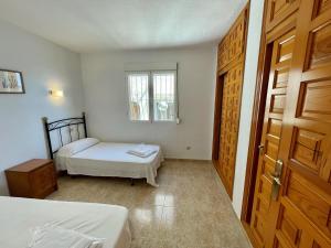 Postel nebo postele na pokoji v ubytování Apartamento Panorama X0089 - Salco la Cumbre
