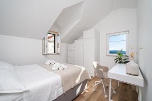 Postel nebo postele na pokoji v ubytování Heritage Island Escape - Casa Bola- Boutique Retreat + 37 fotografií