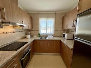Kuchyňa alebo kuchynka v ubytovaní Apartamento Jardines PG014 - Salco la Cumbre