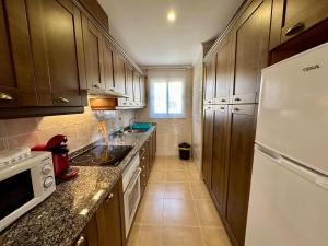 Kuchyň nebo kuchyňský kout v ubytování Apartamento Jardines PG010 - Salco la Cumbre