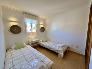 Postel nebo postele na pokoji v ubytování Apartamento Jardines PG010 - Salco la Cumbre