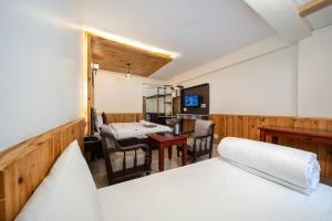 Voodi või voodid majutusasutuse Hotel Monal toas