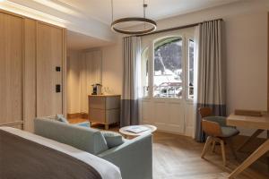 Posezení v ubytování Kempinski Palace Engelberg