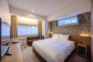 TV a/nebo společenská místnost v ubytování Hotel Gracery Ginza