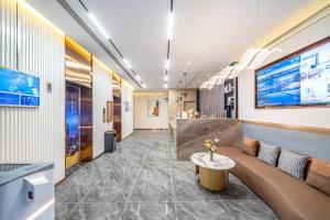 Μια τηλεόραση ή/και κέντρο ψυχαγωγίας στο Waiting Hotel Shanghai Wujiaochang Huangxing Road Branch