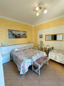Posteľ alebo postele v izbe v ubytovaní La Casa Del Sole