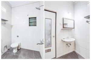 Koupelna v ubytování Super Hotel O Nashik