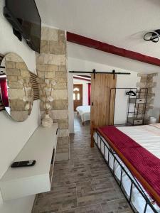 Posteľ alebo postele v izbe v ubytovaní Apartmani SANDRA - TROGIR