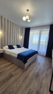 En eller flere senge i et værelse på The Great Sofi Residence A6