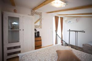 Voodi või voodid majutusasutuse Dalmatinisches Haus In Der Altstadt Von Split toas