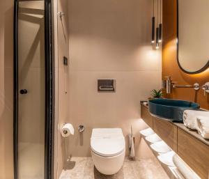 Koupelna v ubytování Emilion Hotel
