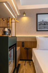 Postel nebo postele na pokoji v ubytování Emilion Hotel