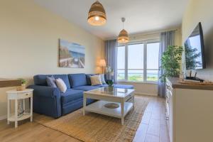 TV a/nebo společenská místnost v ubytování Apartment BLUE LAGOON