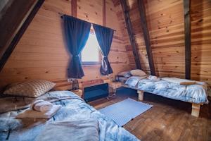 Postel nebo postele na pokoji v ubytování Prima Vista 2