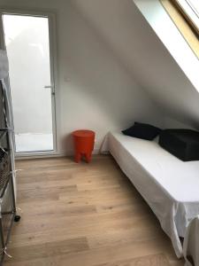 Postel nebo postele na pokoji v ubytování Longère Belle Ile en Mer Locmaria