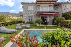 Bazén v ubytování Tyros Boutique Houses Villas nebo v jeho okolí + 31 fotografií