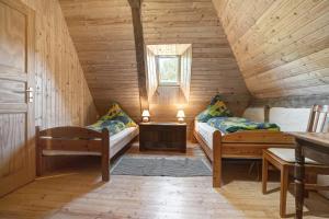 Ένα ή περισσότερα κρεβάτια σε δωμάτιο στο Ferienwohnung Alte Bauernkate