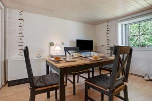 Μια τηλεόραση ή/και κέντρο ψυχαγωγίας στο Ferienwohnung Alte Bauernkate