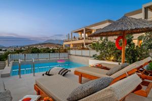 The swimming pool at or close to Ammokrinos Luxury Homes, 150m From Sea Még 36 kép