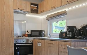 Η κουζίνα ή μικρή κουζίνα στο Tiny Haus 28 Am Brombachsee