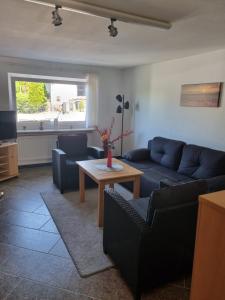 Posezení v ubytování Ferienwohnung Panorama mit Weitblick