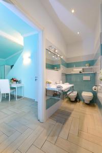 a bathroom with two toilets and a sink at Il Timone in Santa Margherita Ligure