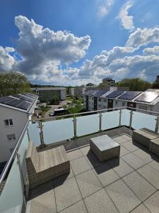 Balkón nebo terasa v ubytování Exklusive COZY 3-Zi-Penthouse mit großer Dachterrasse Nähe Europa Park und Rulantica + 15 fotografií