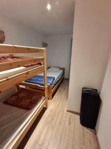Postel nebo postele na pokoji v ubytování Gîte le Nid du Colibri - 12 pers