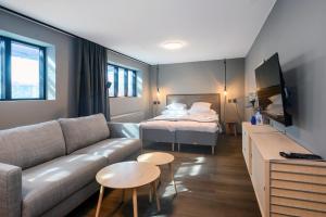 Voodi või voodid majutusasutuse Blomlöfs Hotell Saltö toas