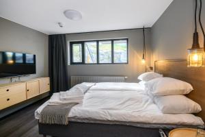 Voodi või voodid majutusasutuse Blomlöfs Hotell Saltö toas