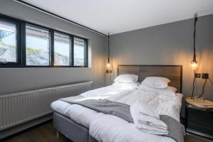 Voodi või voodid majutusasutuse Blomlöfs Hotell Saltö toas