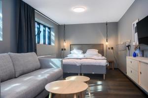 Voodi või voodid majutusasutuse Blomlöfs Hotell Saltö toas
